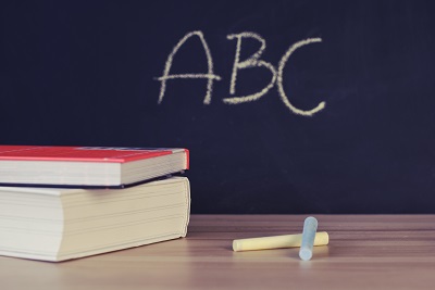 books-and-chalkboard-with-abc scaled.jpg